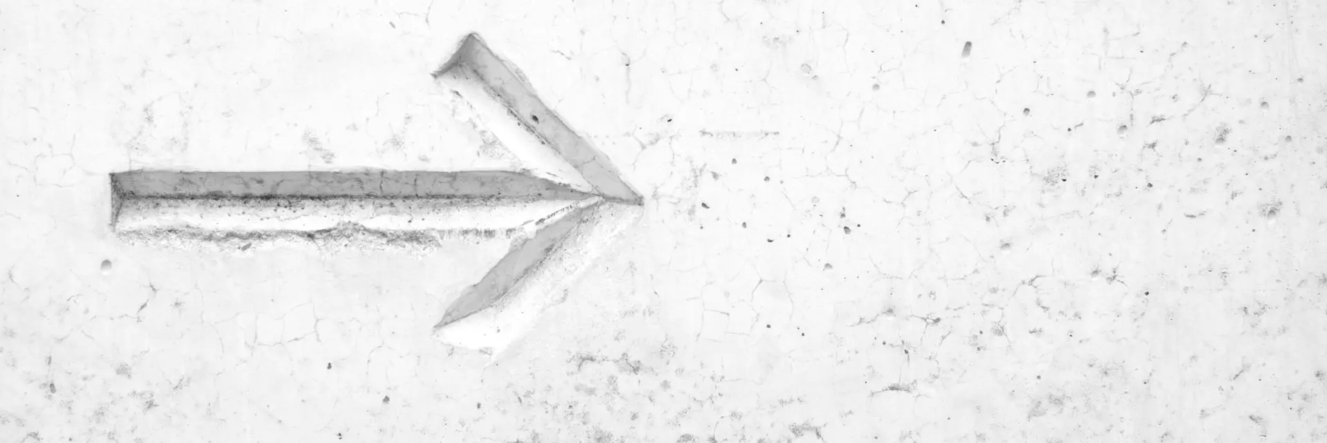 right arrow sign on wall