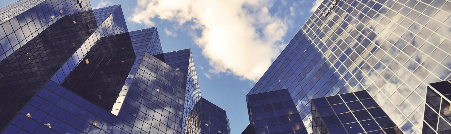 low angle photo of curtain wall building
